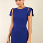 Model wearing the Diva Branwell Pencil dress with tie on shoulders in oxford blue front image
