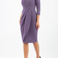 model wearing diva pencil dress tulip design with overlapping pencil skirt with 3 4 sleeves in colour dark mauve front 