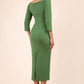brunette model wearing diva catwalk maxi plain three quarter sleeve dress with pleating on shoulders and square neckline in vineyard green back