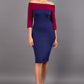 brunette model wearing diva catwalk leon pencil contrast dress with boat off shoulder fold over neckline and three quarter sleeve and empire waistline in navy blue and blissful burgundy front