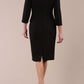 Model wearing back diva catwalk Elsinor 3/4 Sleeve pencil skirt dress with two side pockets in Black 