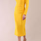 Model wearing diva catwalk Long Sleeved Lydia Midi pencil dress in Sunshine Yellow