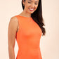 brunette model wearing diva catwalk plain pencil sleeveless dress in hot coral front