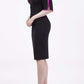 Model wearing the Diva Andorra Pencil dress with V neckline in black and fuchsia front image