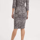 Model wearing the Diva Catherine Jacquard dress with overlapping bodice in circle grey back image