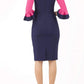 Model wearing the Diva Lyonia Pencil dress in pencil dress design in navy blue and fucshia pink front image