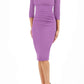 model is wearing diva catwalk polly sleeved pencil dress with low rounded neckline at the back in purple heart front