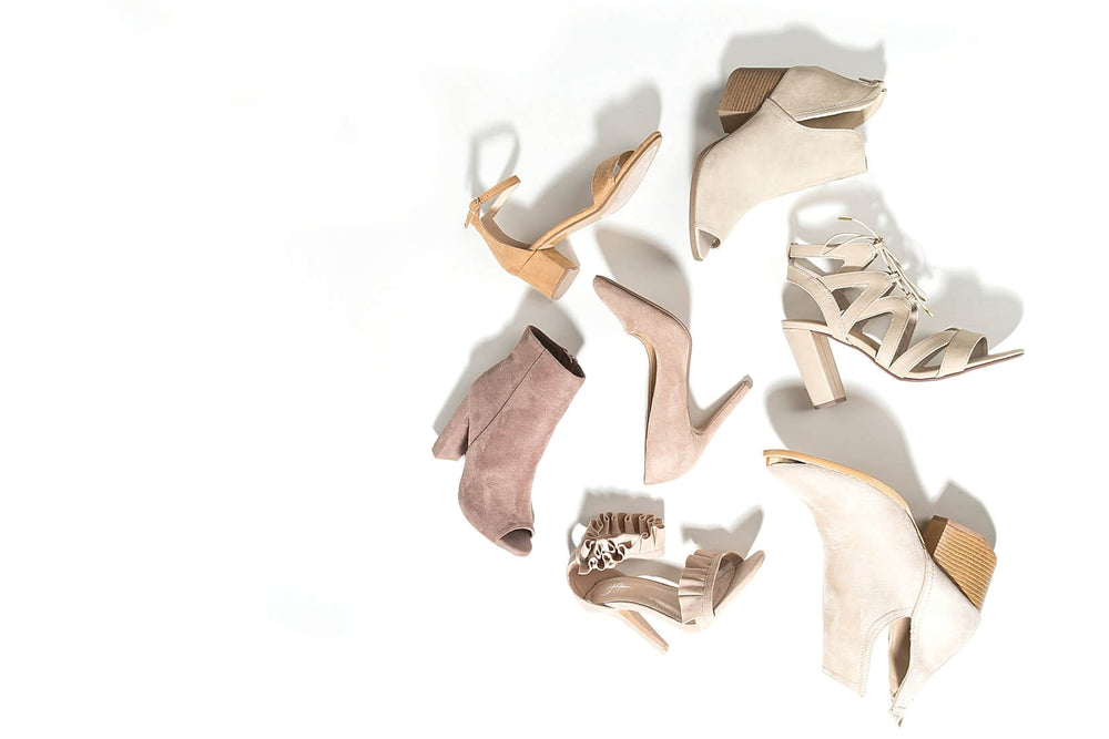 lots of different beige heeled shoes 
