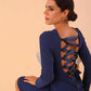 model wearing a diva catwalk Zoey Sleeved Pencil Dress ribbon back with long sleeves and rushed back in Navy Blue colour