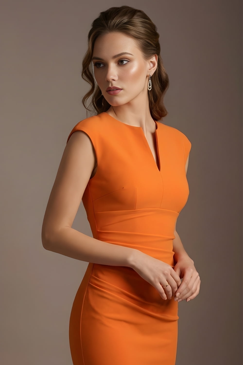 Woman wearing an orange dress against a brown background (Sun Orange)