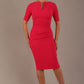 blonde model is wearing diva catwalk lydia short sleeve pencil fitted dress in paradise pink colour with rounded neckline with a slit in the middle front