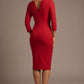 Woman wearing a red dress with a plain background back view- Seed Agatha Sleeved Pencil Dress (Crimson Pink)