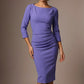 Woman wearing a diva catwalk light blue dress against a brown background - Seed Agatha Sleeved Pencil Dress (Dawin Indigo)