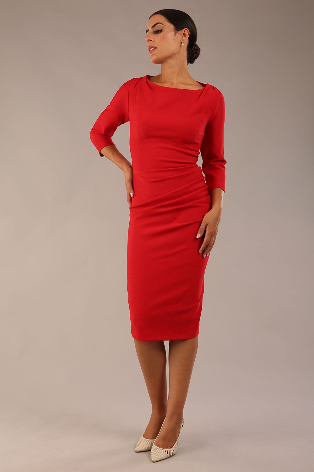 Model wearing the Seed Agatha in pencil dress design in salsa red front image