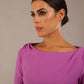 Model wearing the Seed Agatha in pencil dress design in magenta mist close up front image