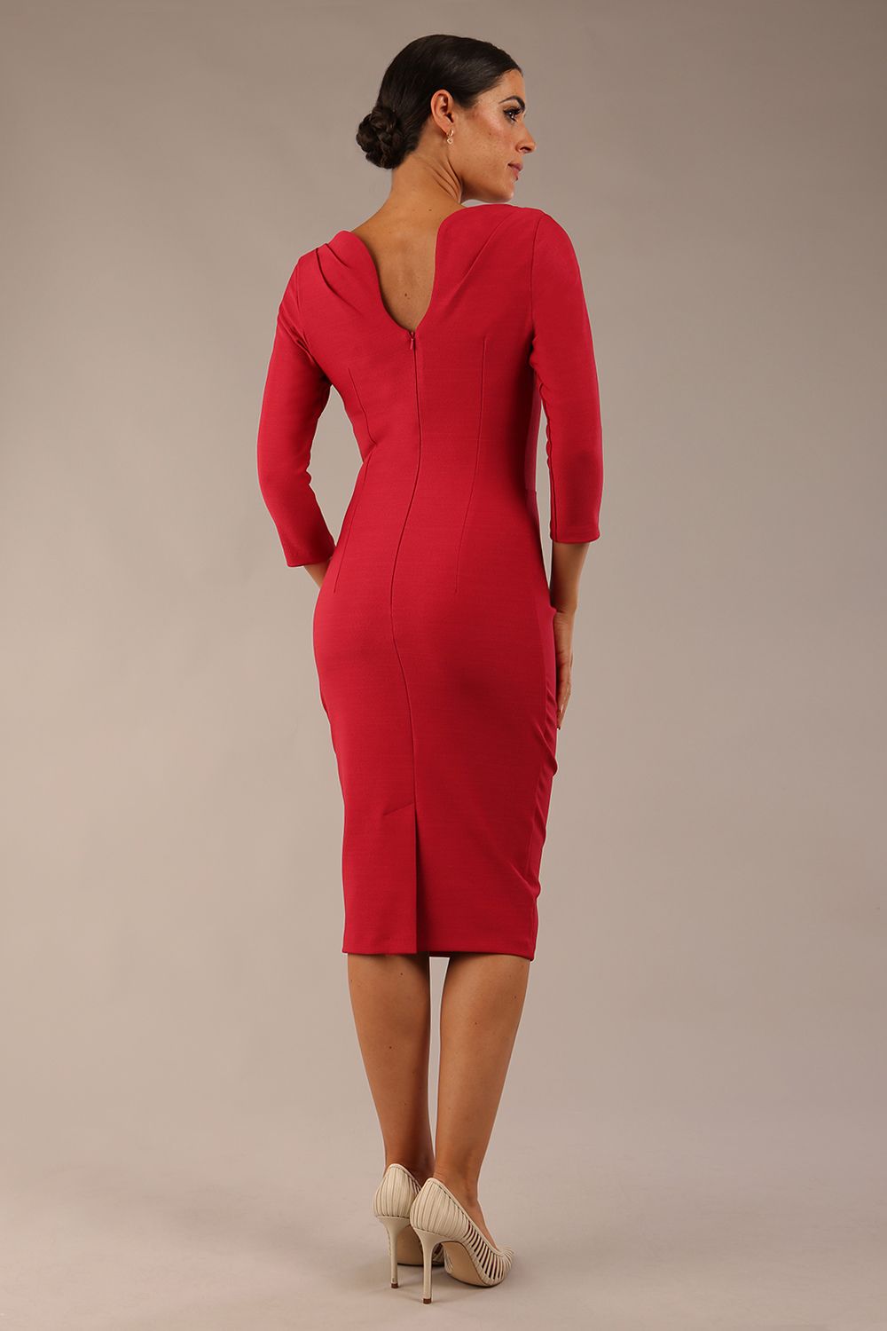 Model wearing the Seed Agatha in pencil dress design in crimson pink back image