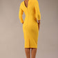 Model wearing the Seed Agatha in pencil dress design in daffodil yellow back image