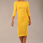 Model wearing the Seed Agatha in pencil dress design in daffodil yellow front image