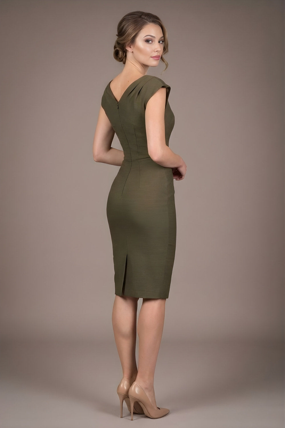 Woman wearing a diva catwalk green dress against a brown background side back view- Seed Anna Sleeveless Pencil Skirt Dress (Olive Green)