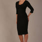 Woman wearing a diva catwalk Seed Greenwich Sleeved Pencil Dress in black colour with a plain background