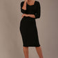 Woman wearing a diva catwalk Seed Greenwich Sleeved Pencil Dress in black colour with a plain background