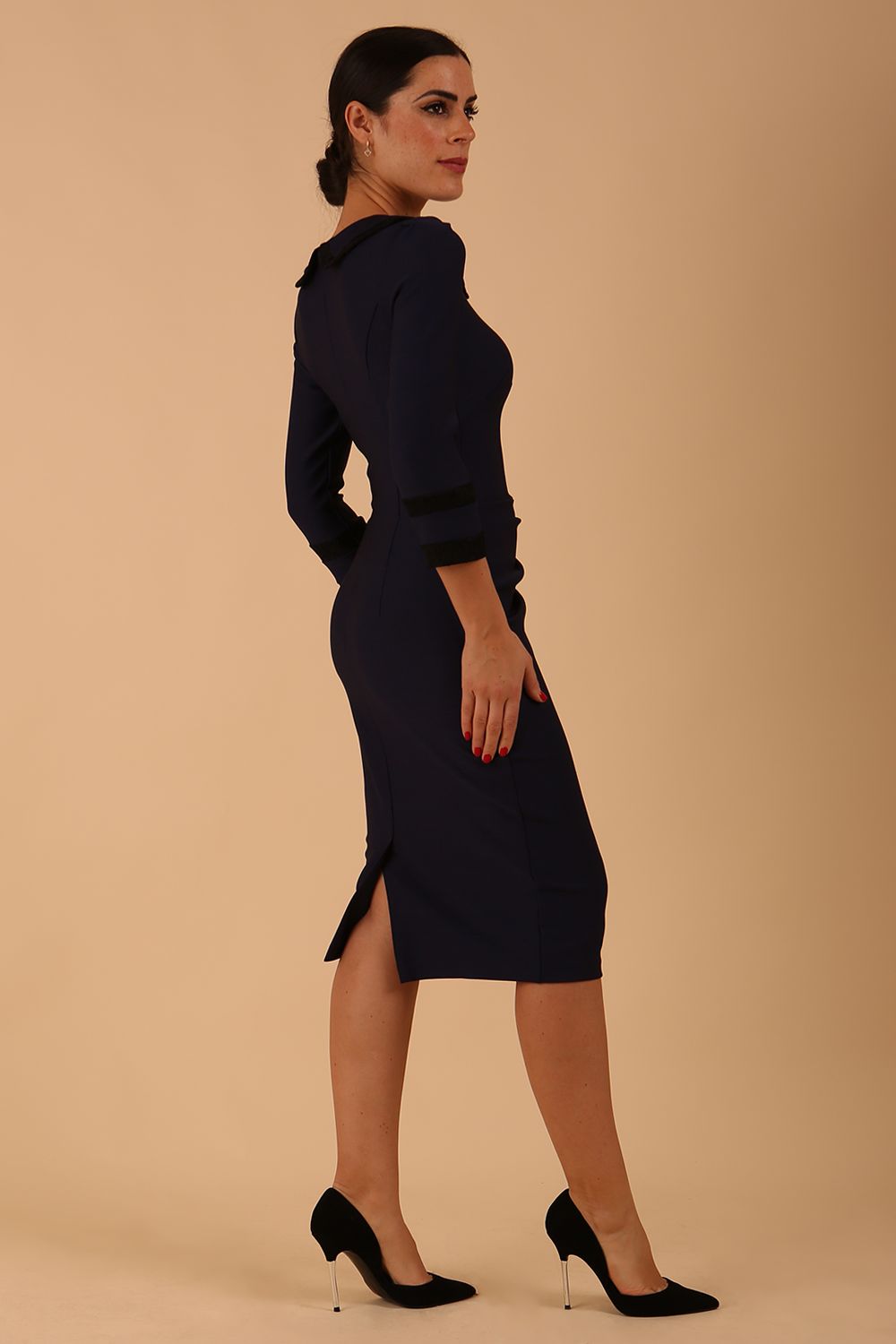 model wearing seed julia dress in navy blue colour