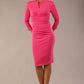 model wearing diva catwalk donna pencil dress with wide band and sleeves and rounded neckline with low split in Hibiscus Pink colour front