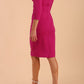 model wearing diva catwalk donna pencil dress with wide band and sleeves and rounded neckline with low split in Magenta colour back