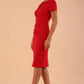 Model wearing Diva Catwalk Donna Short Sleeve Pencil Dress with a wide band and pleating across the tummy area in Electric Red front