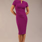 Brunette Model wearing a Diva Catwalk Donna Short Sleeve Pencil Dress with a wide band and pleating across the tummy area and round neckline with v-slit in Royal Purple front image
