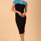 Model wearing the Diva Bryony Contrast dress with contrasting top and exposed zip at the back in black and azure blue front image