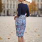Model wearing the Diva Faith Print skirt in pencil skirt design in water garden print BACK image