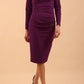 model is wearing diva catwalk cynthia long sleeve pencil dress with low v-neckline in Royal Purple front