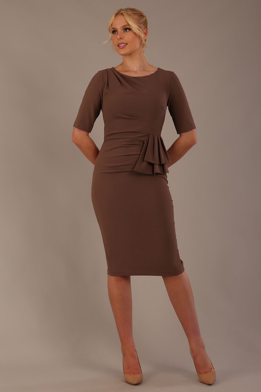 Model wearing the Diva Lynette dress in pencil dress design in peppercorn brown front image