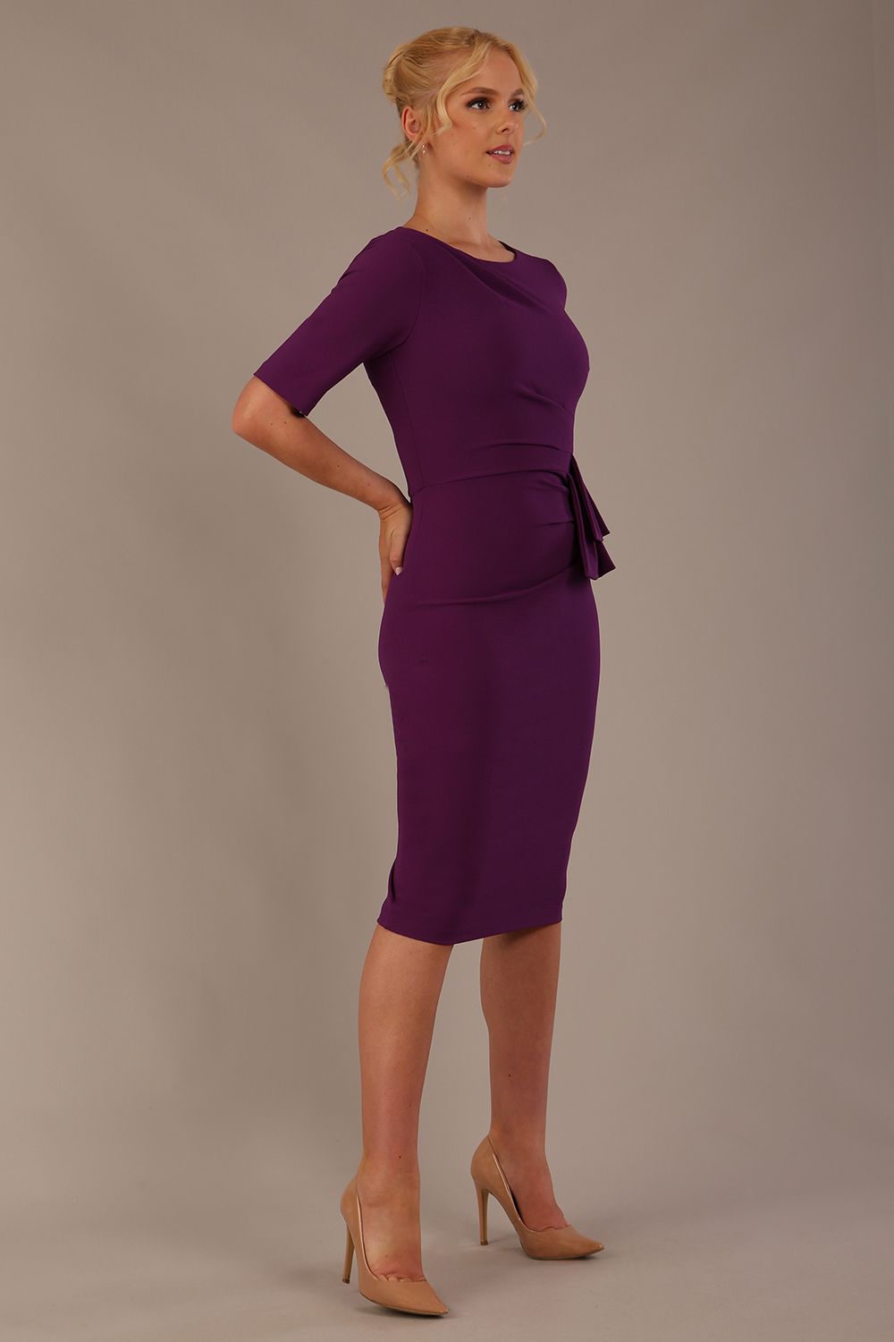 Model wearing the Diva Lynette dress in pencil dress design in royal purple front image