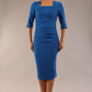 model is wearing a diva catwalk Seed Lexie Pleated Pencil Dress in couture fabric with elbow length sleeves and knee length in sapphire blue colour front