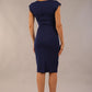 model wearing diva catwalk daphne sleeveless navy blue pencil dress with rounded neckline with split in the middle