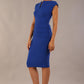 model wearing diva catwalk daphne sleeveless burn orange pencil dress with rounded neckline with split in the middle in front in Cobalt Blue front