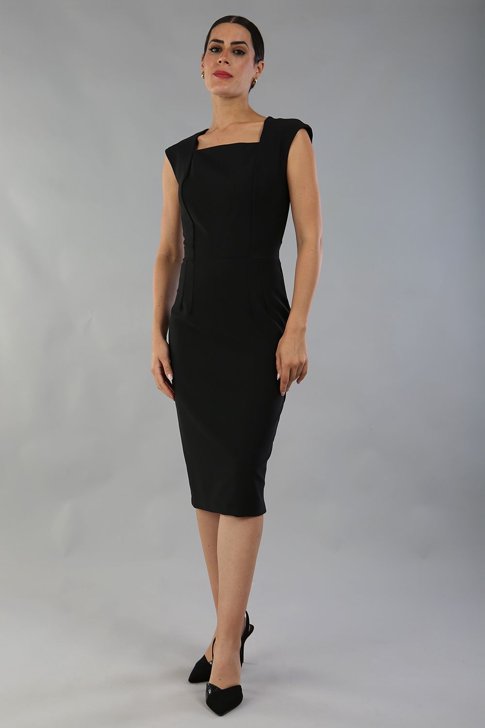 model is wearing diva catwalk seed cadiz pencil sleeveless dress in black front