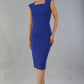 model is wearing diva catwalk seed cadiz pencil sleeveless dress in monaco blue front