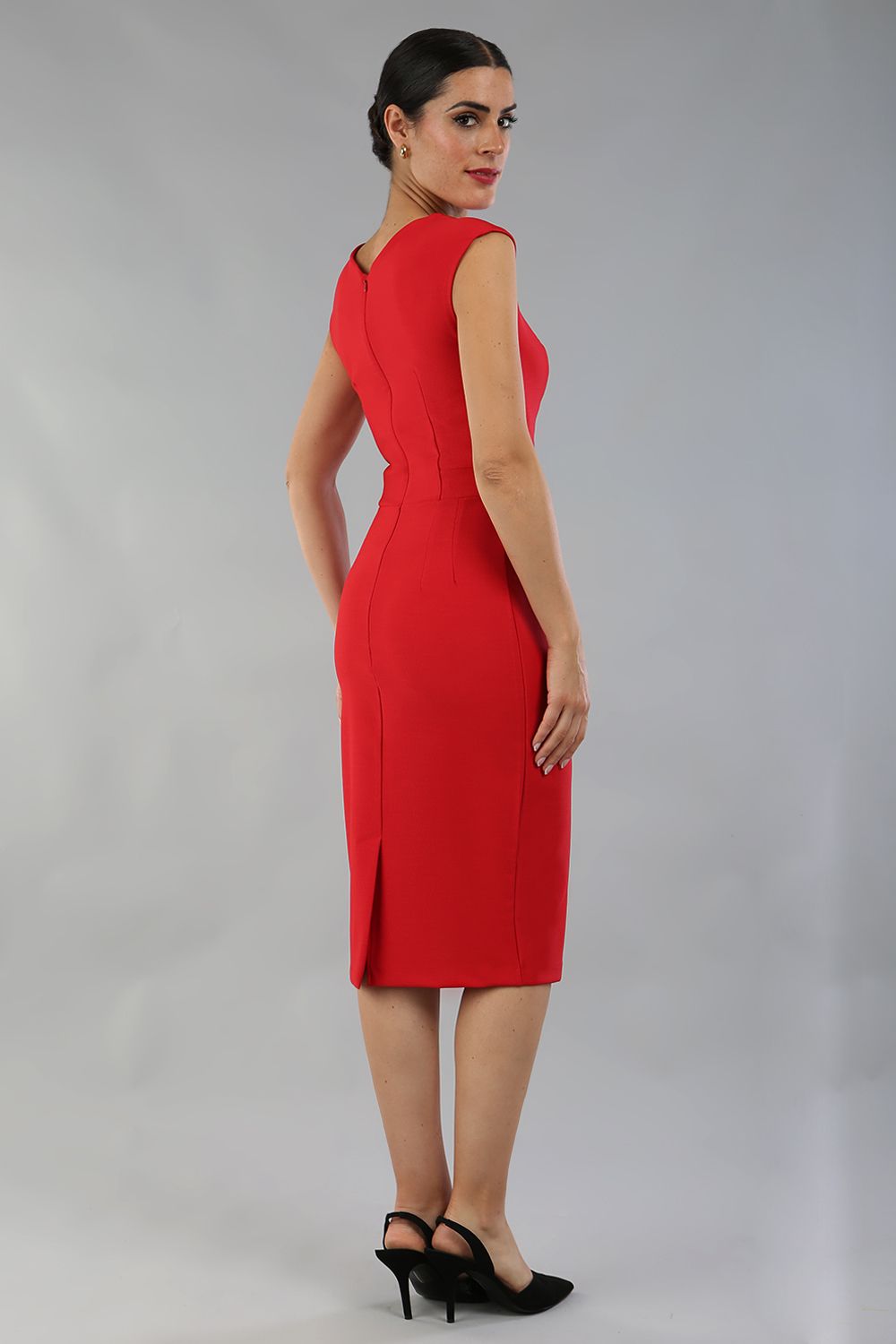 model is wearing diva catwalk seed cadiz pencil sleeveless dress in salsa red front