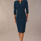 Model wearing the Diva Daphne ¾ Sleeved dress with pleat detail across the hips and ¾ sleeve length in glorious teal front