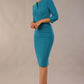 Model wearing the Diva Daphne ¾ Sleeved dress with pleat detail across the hips and ¾ sleeve length in mosaic blue front