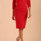 Model wearing the Diva Daphne 3/4 Sleeved dress with pleat detail across the hips and 3/4 sleeve length in Electric Red front