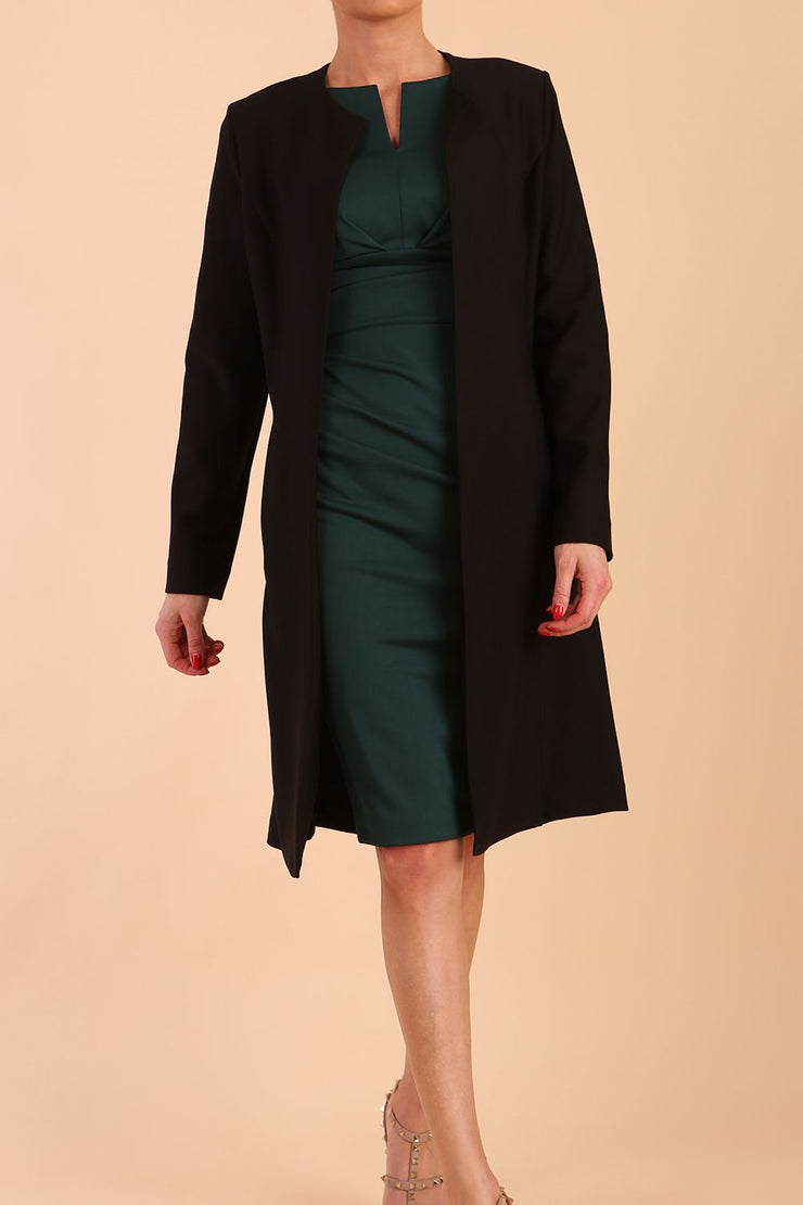 model wearing diva catwalk teal coat with long sleeves and a belt in Black front
