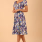 Model wearing a diva catwalk Iris Print Dress short sleeve swing skirt in Kew print front