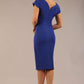 brunette model wearing a diva catwalk Seed Leela Rounded Neckline Cap Sleeved Pencil dress Dress in monaco blue colour back