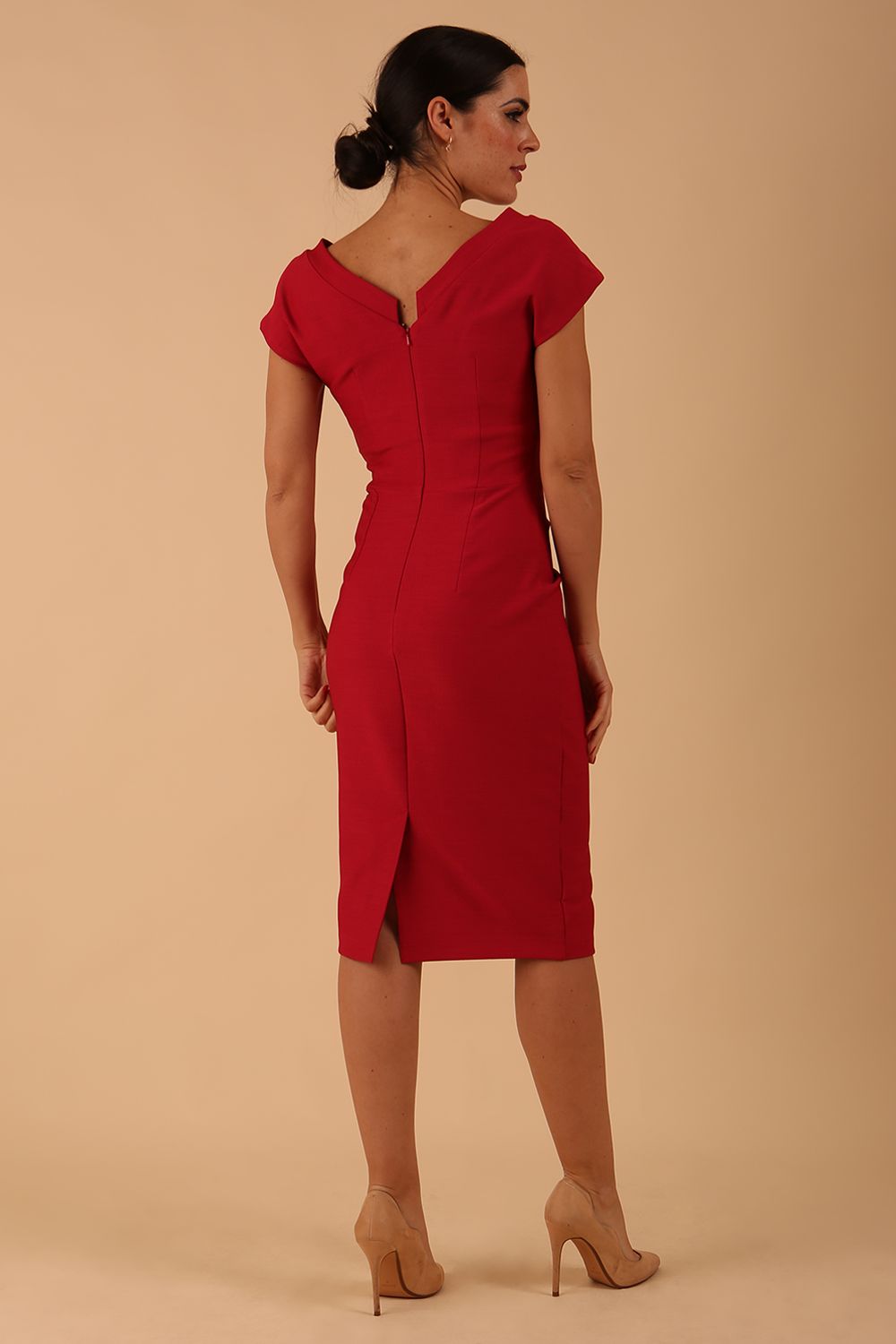 model wearing diva catwalk Seed Leela Rounded Neckline Cap Sleeved Dress in crimson pink colour