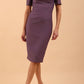 model is wearing diva catwalk seed charlotte pencil plain dress with short sleeve and pleated detail on shoulder in dusky lilac front