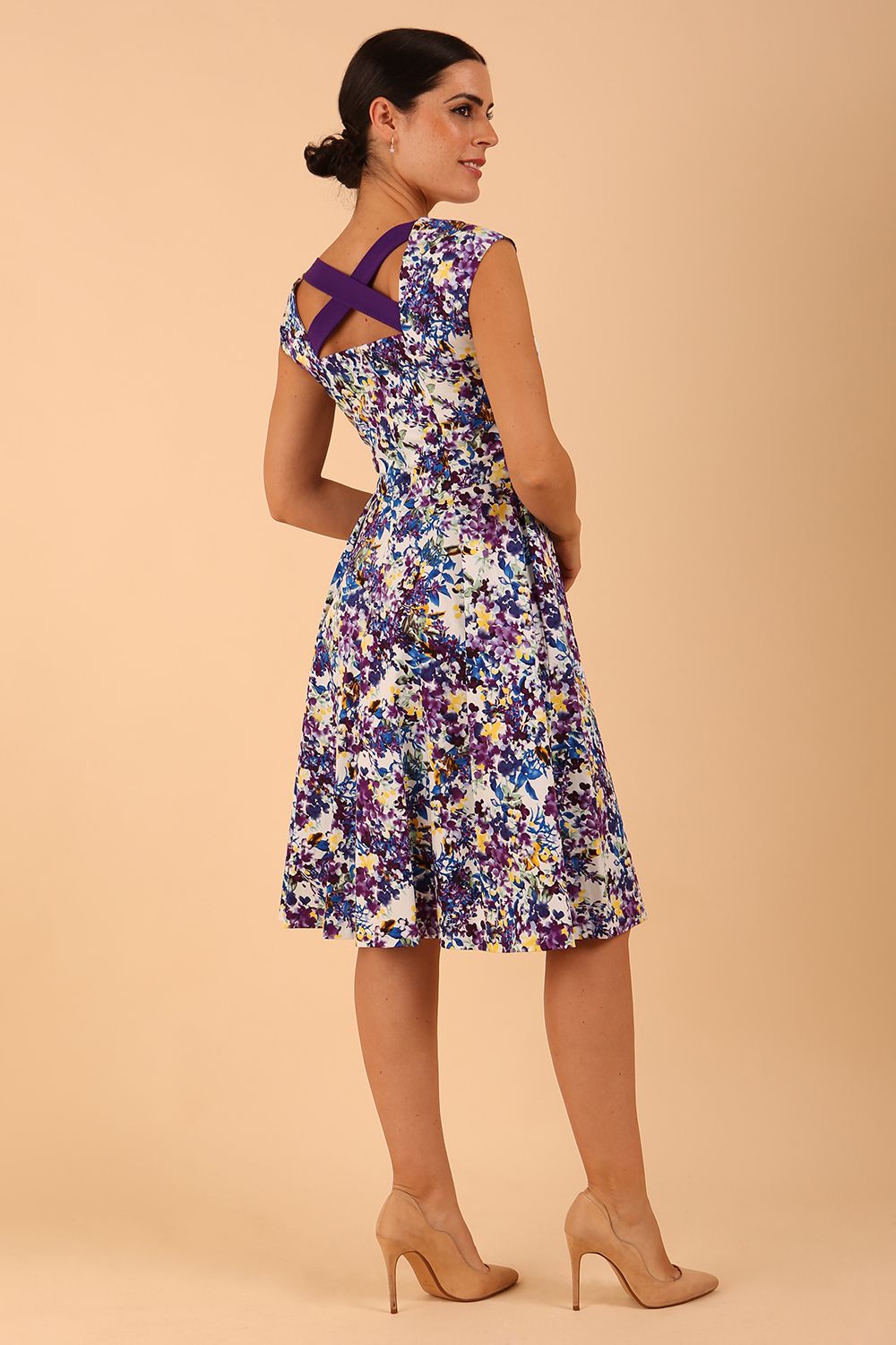 model wearing a diva catwalk Shayla Swing Dress sleeveless swing skirt dress in kew print colour back